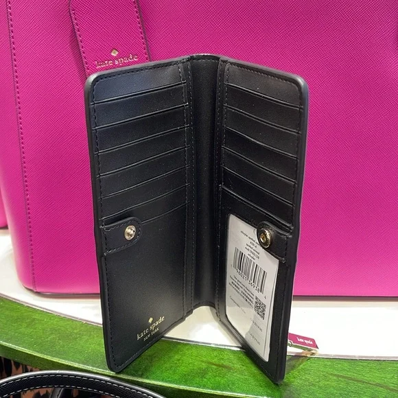 Kate Spade Schuyler Large Slim Bifold Wallet
COLOR:
Multi
NWT - Picture 9 of 16